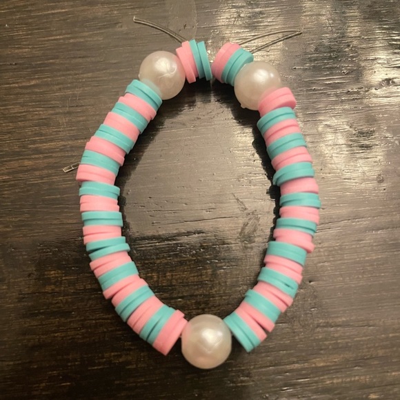 Pink and teal bracelet with 3 purls